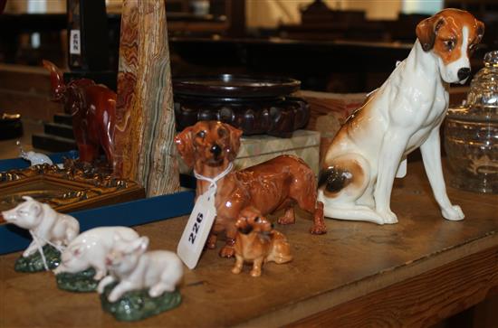 Royal Worcester seated Hound, No 2994, 3 Royal Doulton piglets (HN2648 etc)  and 2 Dachshunds (6)